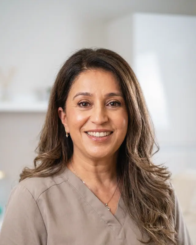 Dr Natalie Olivera, mid-conversation in the clinic.